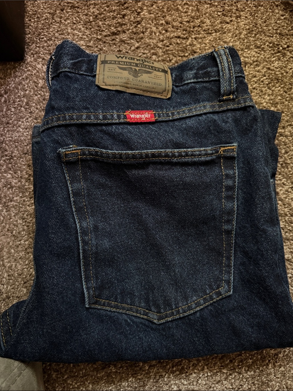Wrangler Indigo Blue Back-Pocket Jeans with Red Tab. Size 32x 34 No holes.